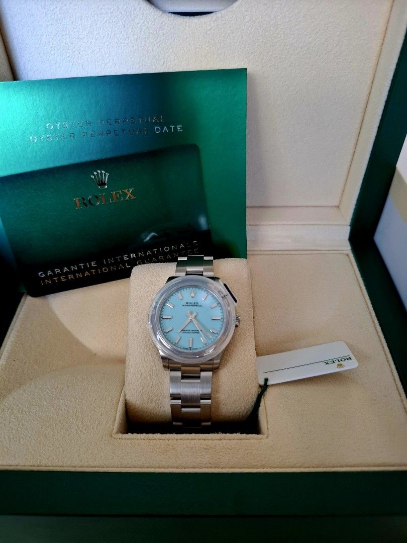 Rolex OP31 Tiffany (Category: Luxury Watches) located in Muntinlupa City. Submitted by victorb85 (Listing ID 1450111898, Image 1). Description: 2026 Brand New OP31 31mm, Tiffany dial with white hangtag with full stickers, untouched bracelet, untouched bezel with protector from ad Full complete brand new set Best gift, best ladies rolex 805,000 Alabang or Makati Area.