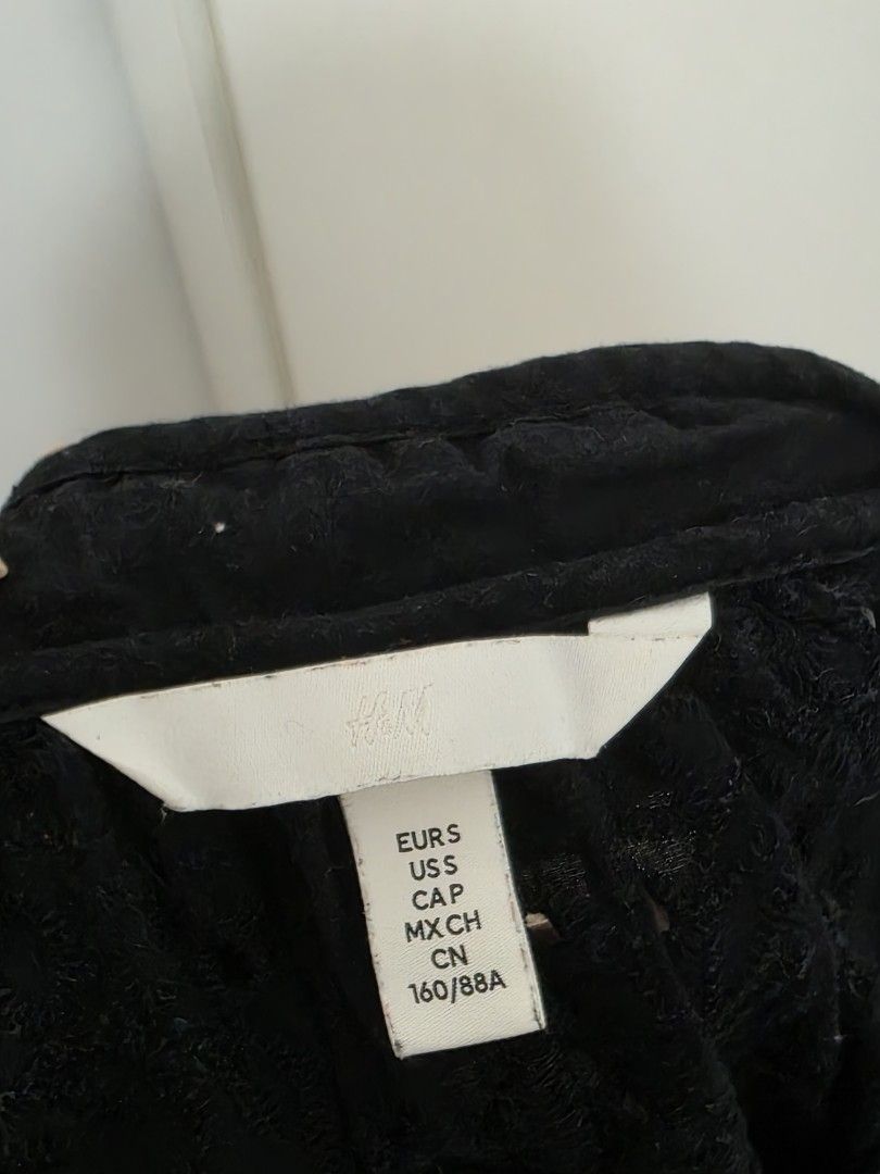 RUSH SALE H&M Black Eyelet Top (Category: Blouses) located in Taguig. Submitted by michellesells0808 (Listing ID 1450109189, Image 3). Description: ❗️BUY MORE TO GET A DISCOUNT❗️ Condition: Used RFS: yearly decluttering ✨️ 📍Taguig Buyer to shoulder delivery fee Can do courier pick up but prefer grab/lala 😊.