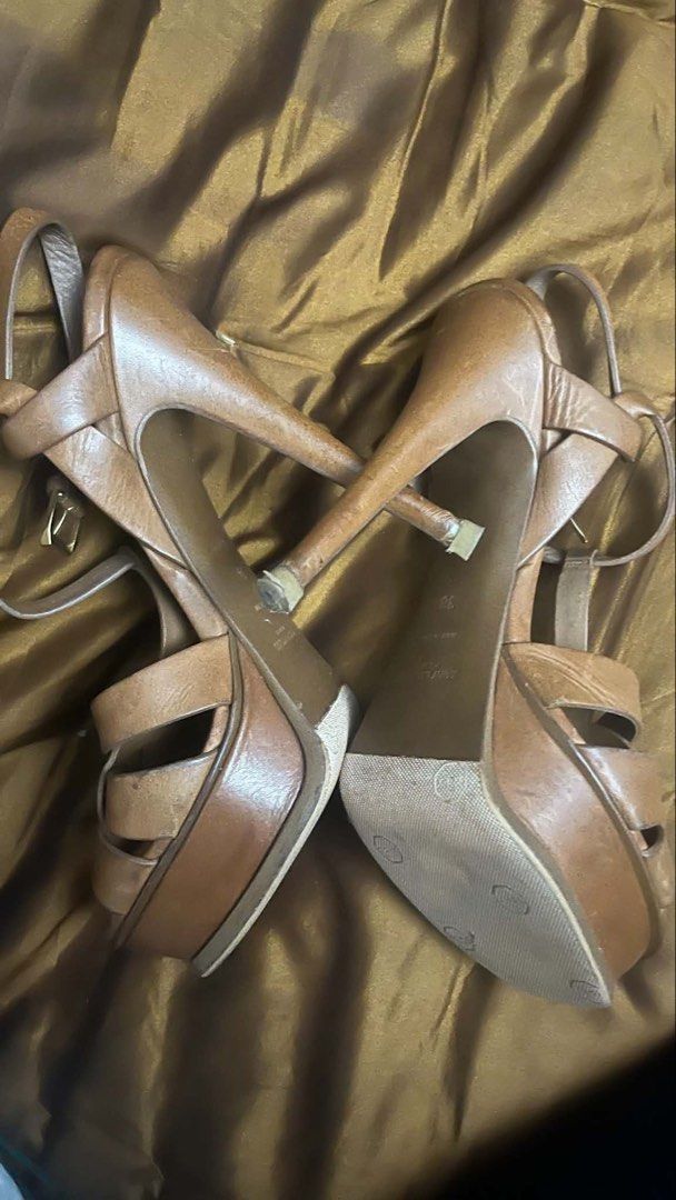 Saint Laurent Paris Brown Leather Platform Heels Size 38 (Category: Heels) located in Makati City. Submitted by babe090817 (Listing ID 1450067069, Image 3). Description: - Brand: Saint Laurent Paris - Material: Brown Leather - Style: Platform Heels - Design: Strappy with ankle strap - Heel Height: Substantial - Condition: Soles show some wear - Size: 38 - Origin: Made in Italy - Occasion: Great for dressing up.