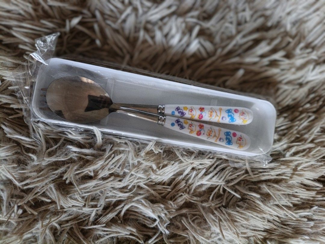 Sanrio Cinnamoroll Spoon and Fork Set with Case (Category: Dinnerware & Cutlery) located in Valenzuela. Submitted by emotika (Listing ID 1449962561, Image 1). Description: - Adorable Cinnamoroll spoon and fork set. - Comes with a cute blue carrying case featuring Cinnamoroll graphics. - Cutlery handles have colorful and playful designs. - Ideal for children or any Cinnamoroll enthusiast. - Portable and convenient for on-the-go use..