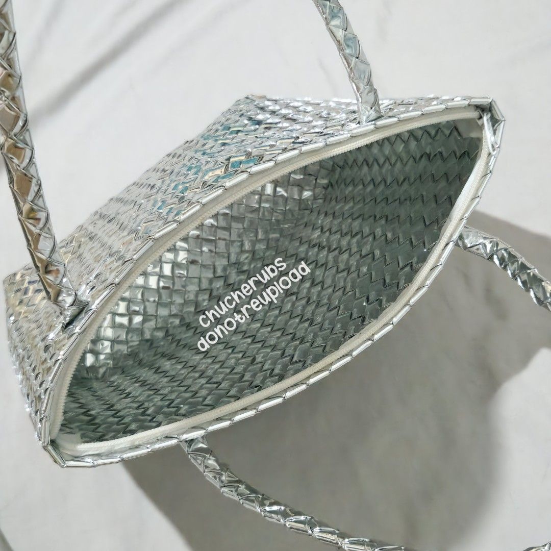 SILVER BAYONG BAG [FREE BAG CHARM] (Category: Beach Bags) located in Paranaque City. Submitted by chucherubs (Listing ID 1450063678, Image 2). Description: wts · lfb · selling what u see is what u get, x sensi ♡ silver bayong bag — ₱450+sf ✅️ pochaco bag charm is FREE ✅️ working zipper rfs: di bagay sa mga outfit ko 🥲 bag dimensions: H 40 cm including handle x W 30 cm x D 10 cm 📍las piñas 🚚 sdd/jnt 💵 bank transfer onhand ph decluttering.