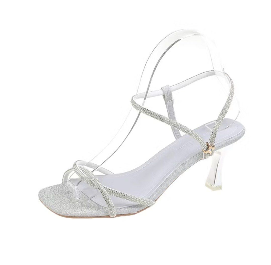 Silver heels (Category: Heels) located in Makati City. Submitted by declutterwithella (Listing ID 1450045034, Image 1). Description: Bought from shoppee for ₱349, used once in a wedding Color: Silver Size: 36 .