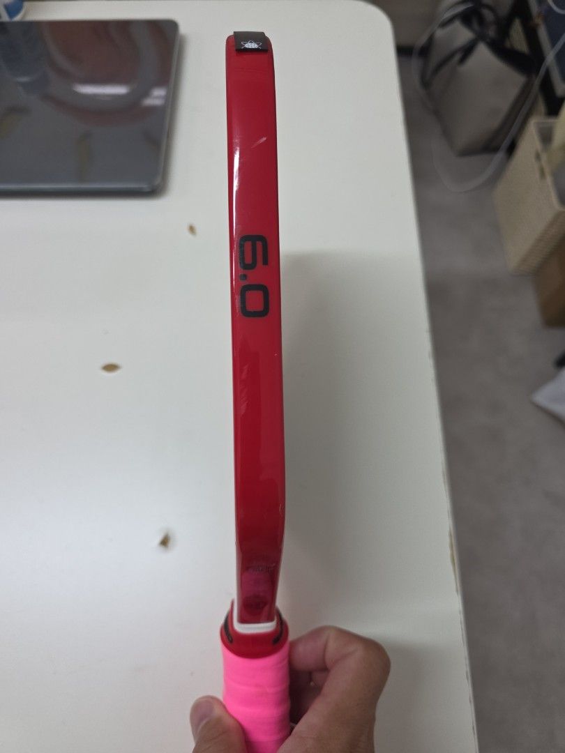 Six Zero Ruby Pro (Category: Racket & Ball Sports) located in Singapore. Submitted by ambrosiaasia (Listing ID 1450097618, Image 4). Description: Bought and only use it 3 times and does not suit my style of play so letting go Cheap My Loss is Your Gain Nego for fast deal.