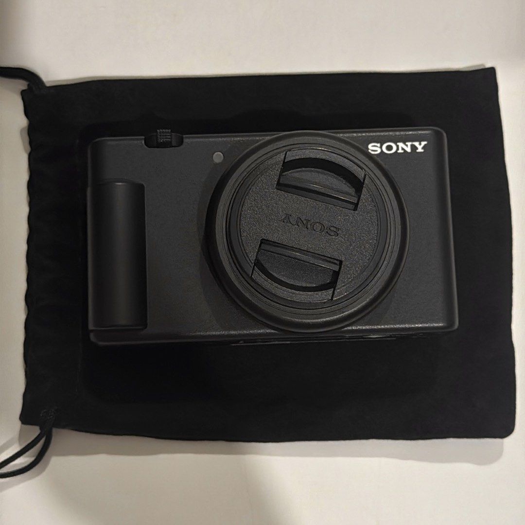 Sony ZV-1F Digital Camera with Grip and Accessories (Category: Cameras) located in Manila. Submitted by preloved_sophia (Listing ID 1450101669, Image 3). Description: Purchased from Sony Store Glorietta - Sony ZV-1 Camera Body - Lens Cap - Black Carrying Pouch - Sony Vlogger Grip (GP-VPT2BT) - Two (2) NP-BX1 Batteries - Battery Charging Cable -64GB Memory Card.