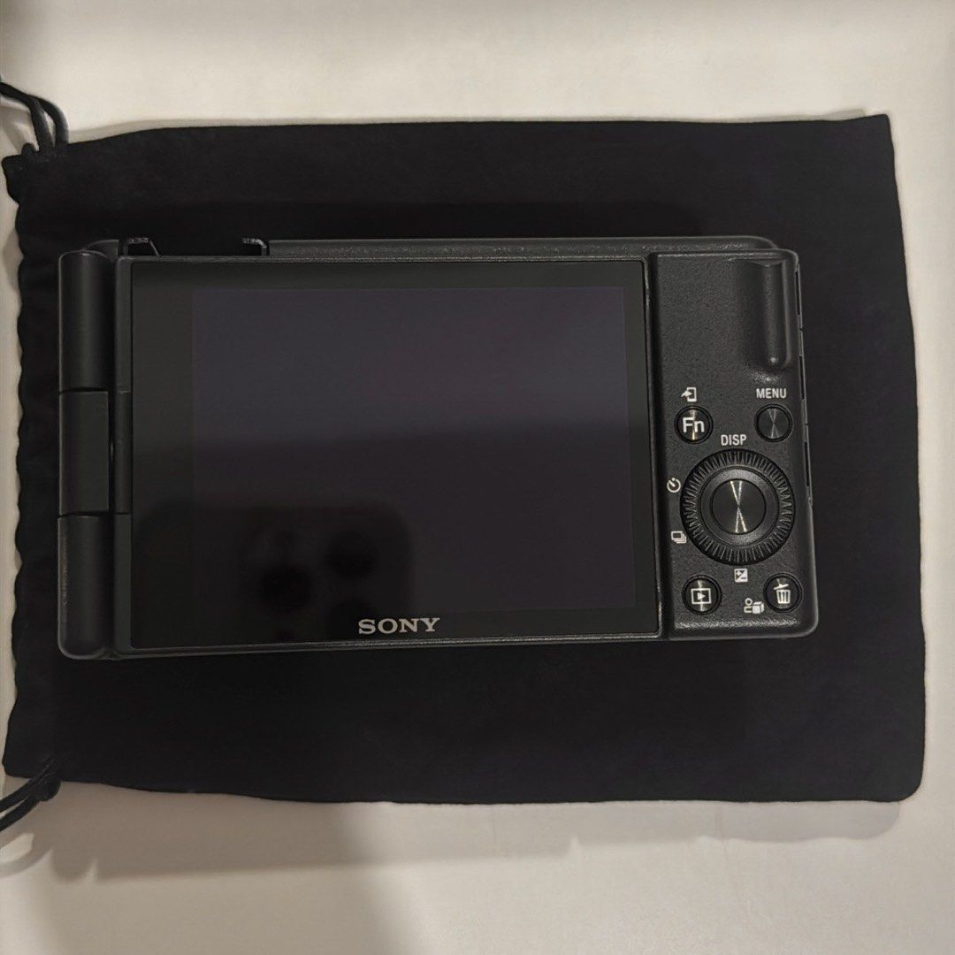 Sony ZV-1F Digital Camera with Grip and Accessories (Category: Cameras) located in Manila. Submitted by preloved_sophia (Listing ID 1450101669, Image 2). Description: Purchased from Sony Store Glorietta - Sony ZV-1 Camera Body - Lens Cap - Black Carrying Pouch - Sony Vlogger Grip (GP-VPT2BT) - Two (2) NP-BX1 Batteries - Battery Charging Cable -64GB Memory Card.