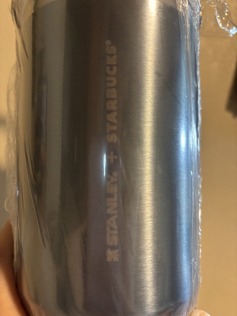 Stanley x Starbucks Tumbler with Handle (Category: Water Bottles & Tumblers) located in Makati City. Submitted by sebastiene (Listing ID 1450001966, Image 3). Description: - Brand new Stanley x Starbucks tumbler - Sleek dark grey/black stainless steel body - Eye-catching light blue lid and yellow handle - Keeps drinks hot or cold for hours - Perfect for travel, work, or everyday use - Still in original plastic packaging.