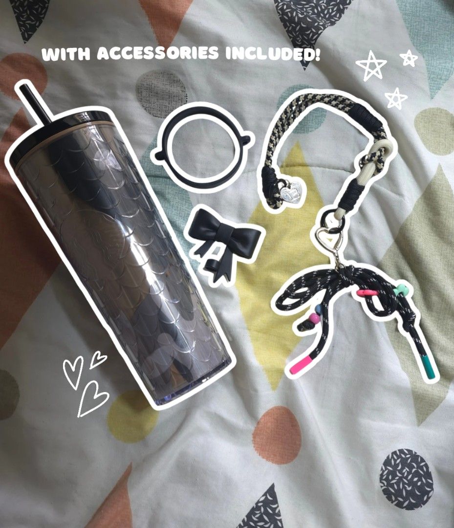 Starbucks Tumbler with Accessories (Category: Water Bottles & Tumblers) located in Taytay. Submitted by ecxds (Listing ID 1450048307, Image 1). Description: - Authentic Starbucks tumbler - Includes straw - Comes with cute accessories: bow, ring, and braided strap with keychain - Ideal for drinks on the go - All items pictured are included.