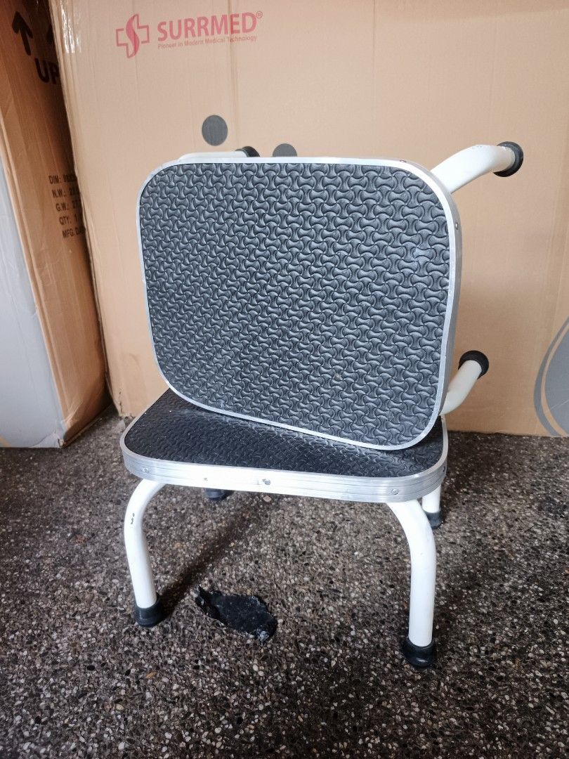 Surrmed Step Stool (Category: Medical Supplies & Tools) located in Quezon City. Submitted by baborjerry58098 (Listing ID 1450093867, Image 2). Description: - Sturdy two-tier step stool - Non-slip treads on both steps for safety - Durable white metal frame - Rubber feet for stability - Ideal for reaching high shelves - Assists with mobility - Suitable for home, clinics, and workshops - Compact design for easy storage.