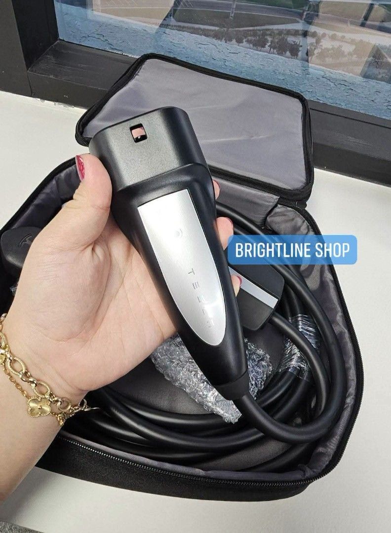 TESLA CHARGER,brand new (Category: Lightings, Horns, and other Electrical Parts and Accessories) located in Pasig City. Submitted by bcvicente71 (Listing ID 1447050594, Image 3). Description: GEV SELLER ‼️*Brandnew Tesla Mobile Connector with free ph power adaptor. “Portable Tesla Charger” P24. 000.00 0905-406-15-89 0919-769-93-99 “The Tesla Mobile Connector is a compact and portable charging solution that lets you charge your Tesla from a standa