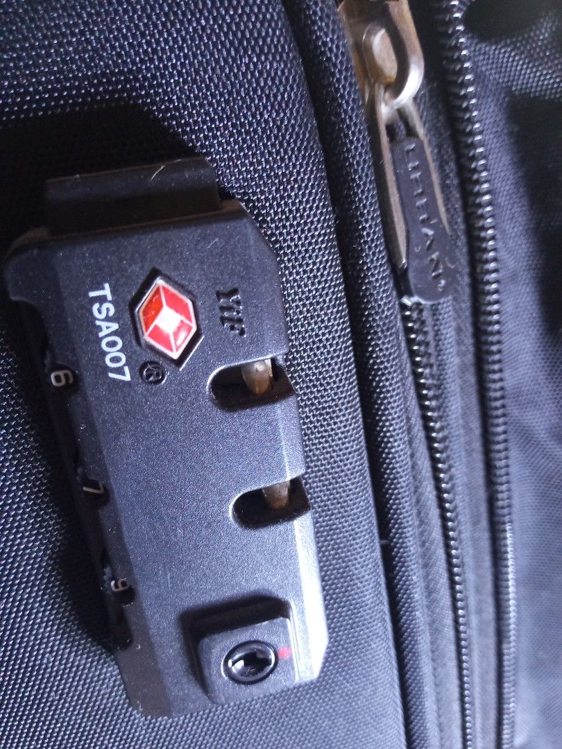 URBAN Black Expandable Luggage with TSA Lock (Category: Luggage) located in Marikina City. Submitted by norman213 (Listing ID 1449982953, Image 3). Description: - URBAN black suitcase - TSA combination lock for security - Expandable design for extra space - Smooth rolling wheels - Retractable handle - Minor scuff marks on the back from normal use.