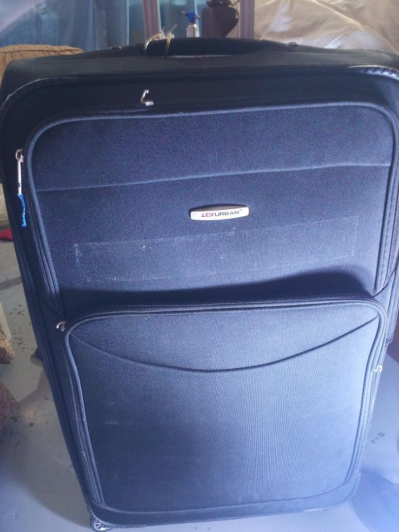URBAN Black Expandable Luggage with TSA Lock (Category: Luggage) located in Marikina City. Submitted by norman213 (Listing ID 1449982953, Image 2). Description: - URBAN black suitcase - TSA combination lock for security - Expandable design for extra space - Smooth rolling wheels - Retractable handle - Minor scuff marks on the back from normal use.