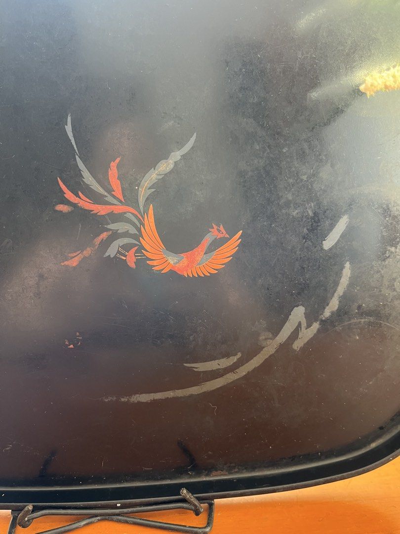Vintage Black Phoenix Lacquer Serving Tray (Category: Other Kitchenware & Tableware) located in Taguig. Submitted by minmin_parker (Listing ID 1450035848, Image 3). Description: - Black lacquer serving tray - Features a beautiful phoenix design - Approximately 16 inches long - Ideal for serving drinks or snacks - Shows some signs of wear, adding to its vintage charm - Adds a unique vintage touch to your home decor.