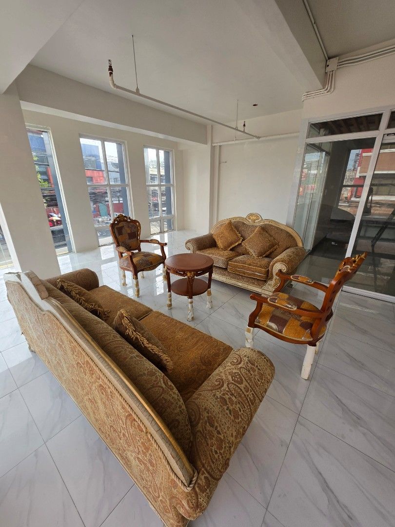Vintage Style Sofa Set with Chairs and Coffee Table (Category: Sofas) located in Las Pinas. Submitted by nbdg06 (Listing ID 1450028421, Image 3). Description: - Vintage-style sofa set - Includes: 1x 3-seater sofa, 1x 2-seater sofa,2x armchairs, 1 x coffee table - Comes with a small round coffee table - Upholstered in patterned fabric - Features ornate wooden trim - Cushions are included - Ideal for living room or lounge area - Needs a new home!.