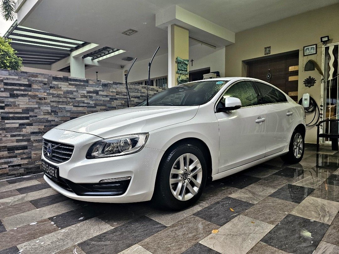 Volvo S60 T2 (A) (Category: Used Cars) located in Singapore. Submitted by 7hardhead7 (Listing ID 1450017096, Image 3). Description: Bulletproof car with excellent FC can go 1200km on a tank with a light foot. Built cruiser with decent power and cheap road tax (1.5L). Has been a great companion and served me well. Zero accidents since new. Car serviced and road tax paid to last till Coe ends. High parf + body value of 14k++ when scrap. In excellen