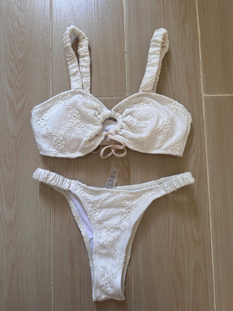 White Crochet Bikini Set (Category: Bikinis & Swimsuits) located in Antipolo. Submitted by waco1313 (Listing ID 1449962997, Image 1). Description: - White crochet bikini set - Textured knit design - Halter neck top with adjustable ties - High-cut bottoms - Ideal for beach or pool days - Comfortable and stylish.