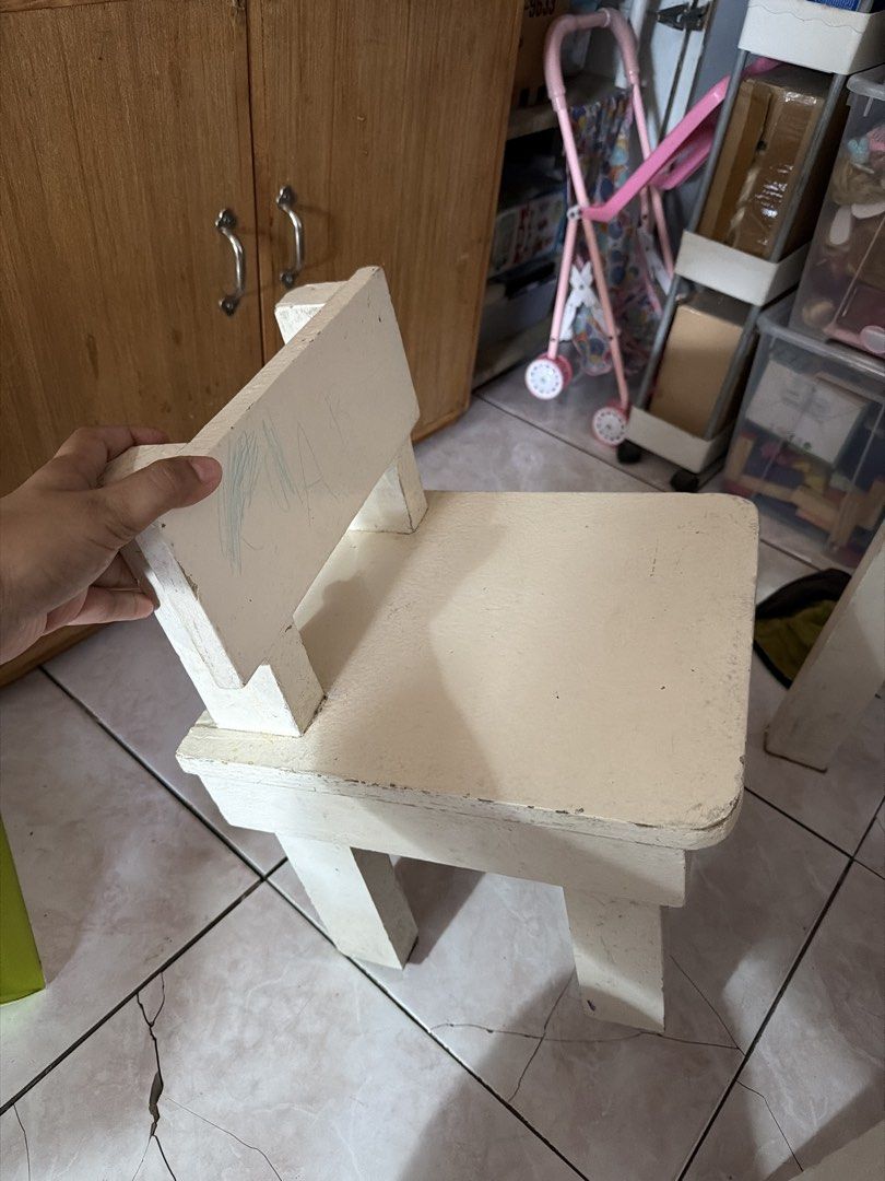 Wooden Kids Table and 2 Chairs Set (Category: Kids Tables & Chairs) located in Manila. Submitted by anyasab2018 (Listing ID 1449988946, Image 3). Description: - Sturdy wooden table and 2 chairs set for kids - Perfect for playtime, arts & crafts, or study time - Shows some signs of use (e.g., crayon marks), but still very functional - Great addition to any playroom or nursery -material is solid wood - Ready for its next adventure in a new home!.
