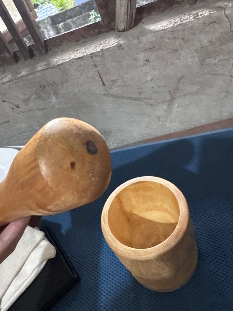 Wooden Mortar and Pestle Set (Category: Other Kitchenware & Tableware) located in Cainta. Submitted by casaesguerra (Listing ID 1450036281, Image 3). Description: - Solid wood construction for durability. - Ideal for grinding spices, herbs, and other ingredients. - Features a beautiful, natural wood grain. - Pestle fits snugly for efficient grinding. - Easy to clean and store. - A timeless and essential kitchen tool..