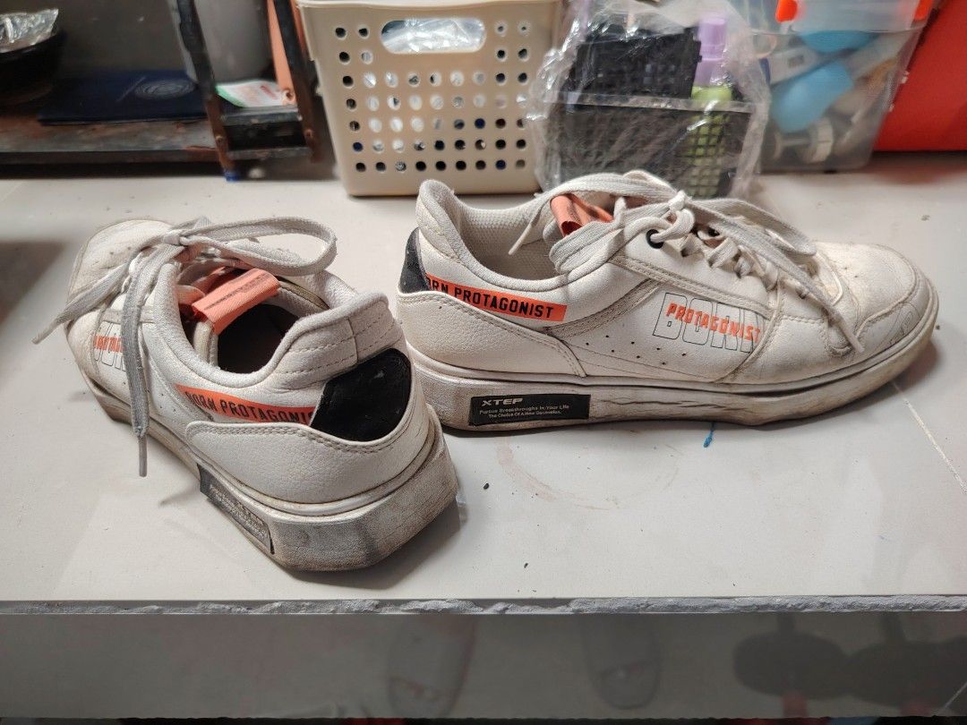 XTEP PROTAGONIST White Sneakers Size 9.5 US (Category: Sneakers) located in Santa Cruz. Submitted by nazhslasher (Listing ID 1449869075, Image 3). Description: - Brand: XTEP PROTAGONIST - Color: White with Orange accents - Size: 9.5 US - Condition: Used, with visible wear on soles and toe box. Still has plenty of life left. - Price: 250 PHP+Sf via JNT.