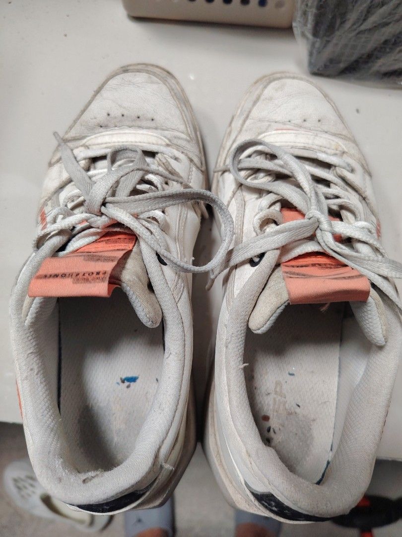 XTEP PROTAGONIST White Sneakers Size 9.5 US (Category: Sneakers) located in Santa Cruz. Submitted by nazhslasher (Listing ID 1449869075, Image 2). Description: - Brand: XTEP PROTAGONIST - Color: White with Orange accents - Size: 9.5 US - Condition: Used, with visible wear on soles and toe box. Still has plenty of life left. - Price: 250 PHP+Sf via JNT.
