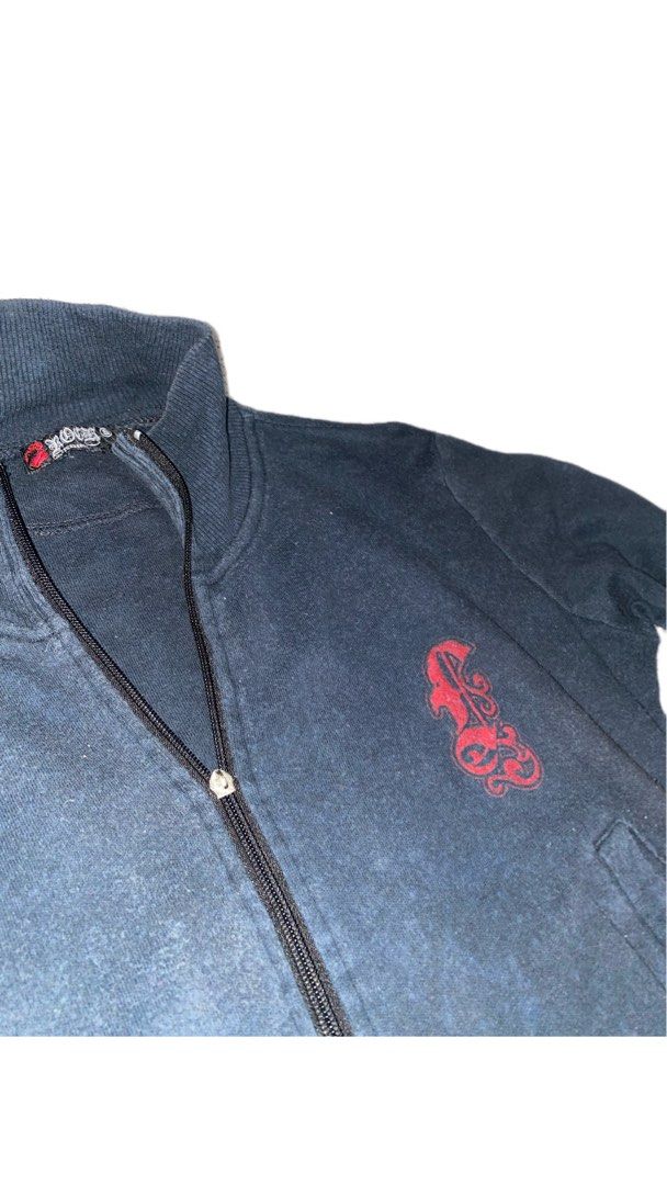 Zip-Up Jacket with Red Graphic (Category: Coats, Jackets and Outerwear) located in Manila. Submitted by masterjonas (Listing ID 1450007157, Image 2). Description: - Cool dark blue zip-up jacket - Red graphic design on front left chest - Larger red graphic design on the back - Ribbed cuffs and hem - Zipper closure - Two front pockets - Great for casual wear -good for cubao expo fits .