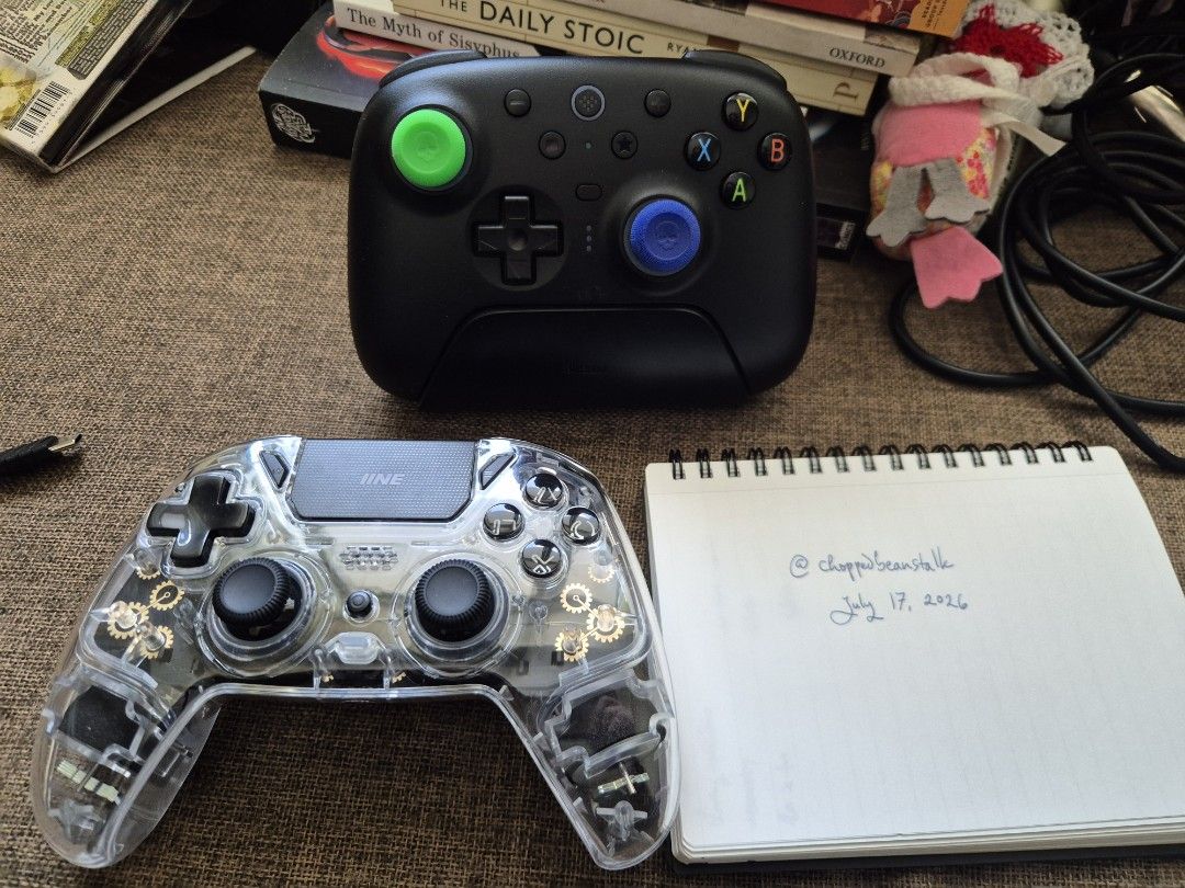 8bitdo Ultimate 2 Controller Bundle (Category: Controllers) located in Pasig City. Submitted by choppedbeanstalk (Listing ID 1450176510, Image 1). Description: Selling as a bundle only - 8bitDo Ultimate 2 - XBox layout, used as controller for gaming laptop, compatible with PC, Mac, Android - IINE Bastet - used as PS4 controller, compatible with PC, Mac, PS4, and Nintendo Switch 1 Inclussion: - Two controllers - Original cables - 8bitDo charging d