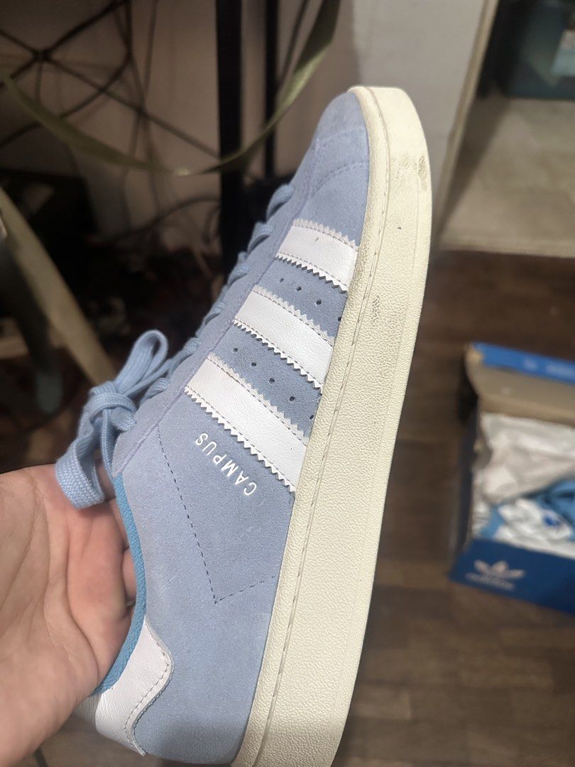 Adidas Campus Light Blue Suede Sneakers (Category: Sneakers) located in Las Pinas. Submitted by inb.l (Listing ID 1450228586, Image 2). Description: Adidas Campus 00s suede material, light blue. size US 11 used 3-4 times only. still very good condition comes with alternate shoe laces issues: very slight chipping of suede - Classic light blue Adidas Campus sneakers - Suede material with iconic white stripes - Comes with original box - Includes ext