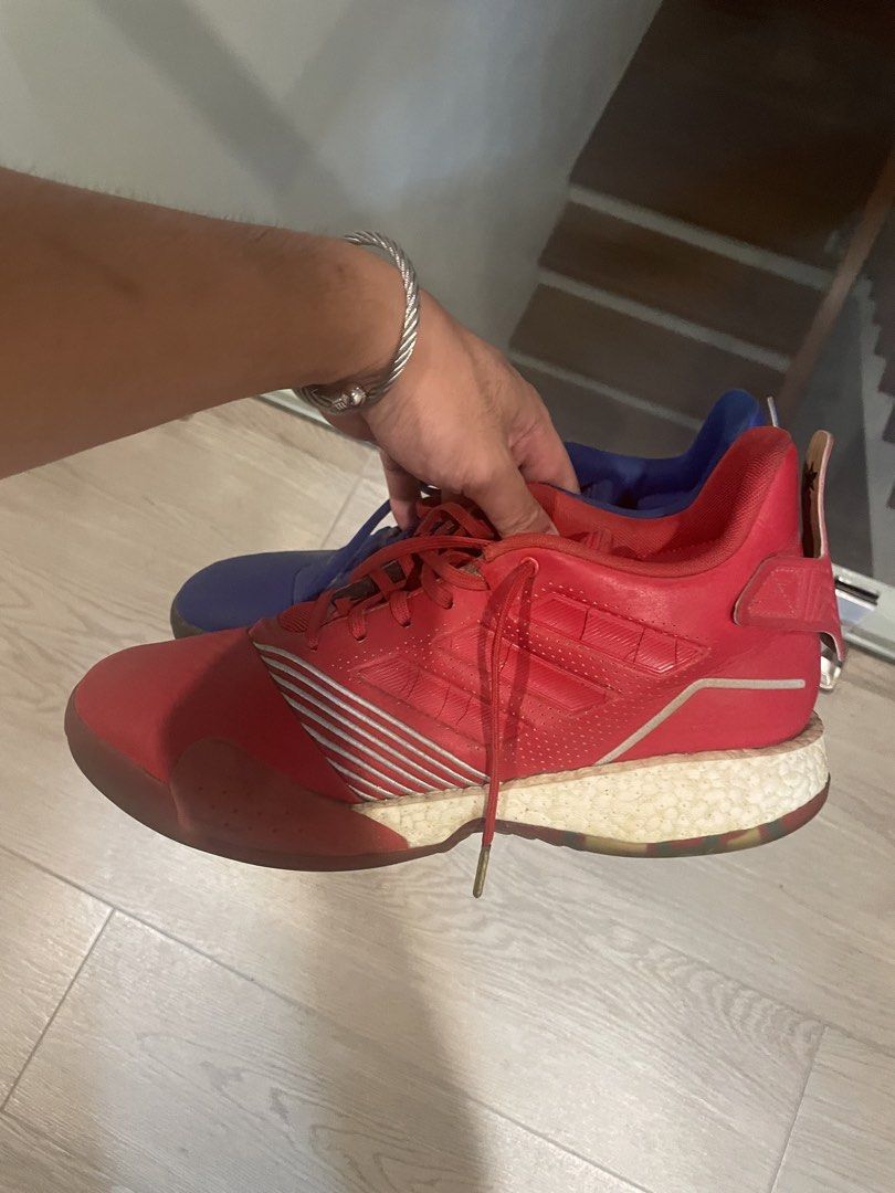 Adidas TMAC Vol all star edition (Category: Sneakers) located in Angeles City. Submitted by lukemafinds (Listing ID 1450287494, Image 2). Description: - Adidas Tmac Allstar edition - Unique mismatched colors: one red shoe, one blue shoe - Equipped with responsive Boost cushioning for comfort and performance - Visible scuffing and wear on soles and uppers, consistent with use - Perfect for playing on the court or adding to a sneaker collection -si
