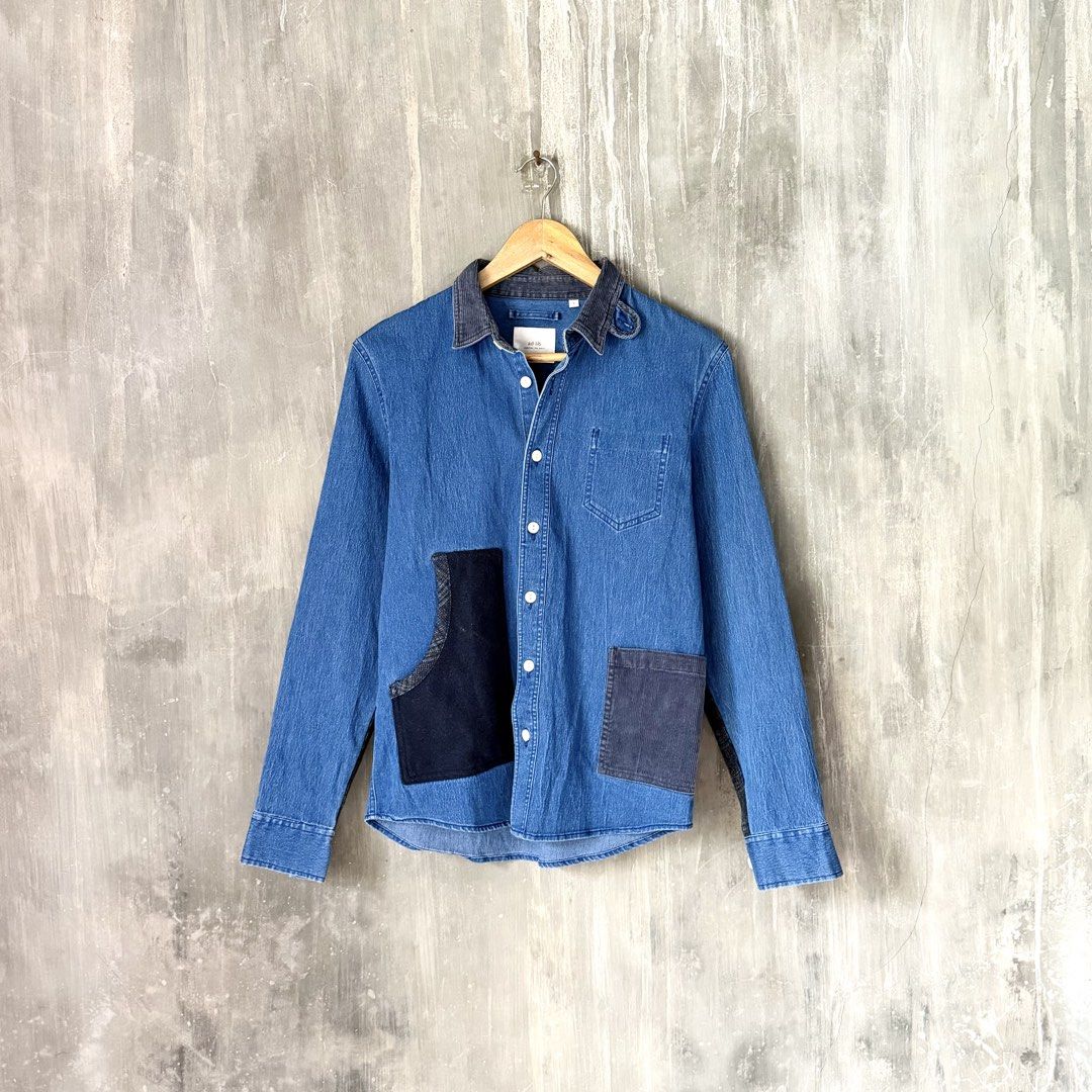 ad-lib Patchwork Denim Overshirt (Category: Tshirts & Polo Shirts ) located in Puerto Princesa. Submitted by terdsthrift (Listing ID 1450272259, Image 2). Description: ad-lib Patchwork Denim Overshirt Size: Small Width: 18 Length: 25 In Excellent Condition - No Flaws Color Rate: 10/10 - Contrasting dark blue patches on front and elbows - Corduroy collar detail - Button-up front with chest pocket - Versatile for layering or standalone wear - Perfe