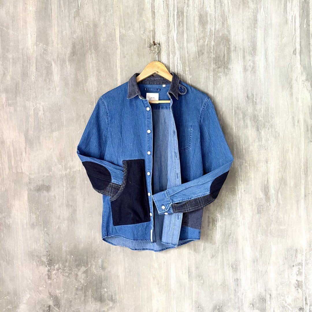 ad-lib Patchwork Denim Overshirt (Category: Tshirts & Polo Shirts ) located in Puerto Princesa. Submitted by terdsthrift (Listing ID 1450272259, Image 3). Description: ad-lib Patchwork Denim Overshirt Size: Small Width: 18 Length: 25 In Excellent Condition - No Flaws Color Rate: 10/10 - Contrasting dark blue patches on front and elbows - Corduroy collar detail - Button-up front with chest pocket - Versatile for layering or standalone wear - Perfe