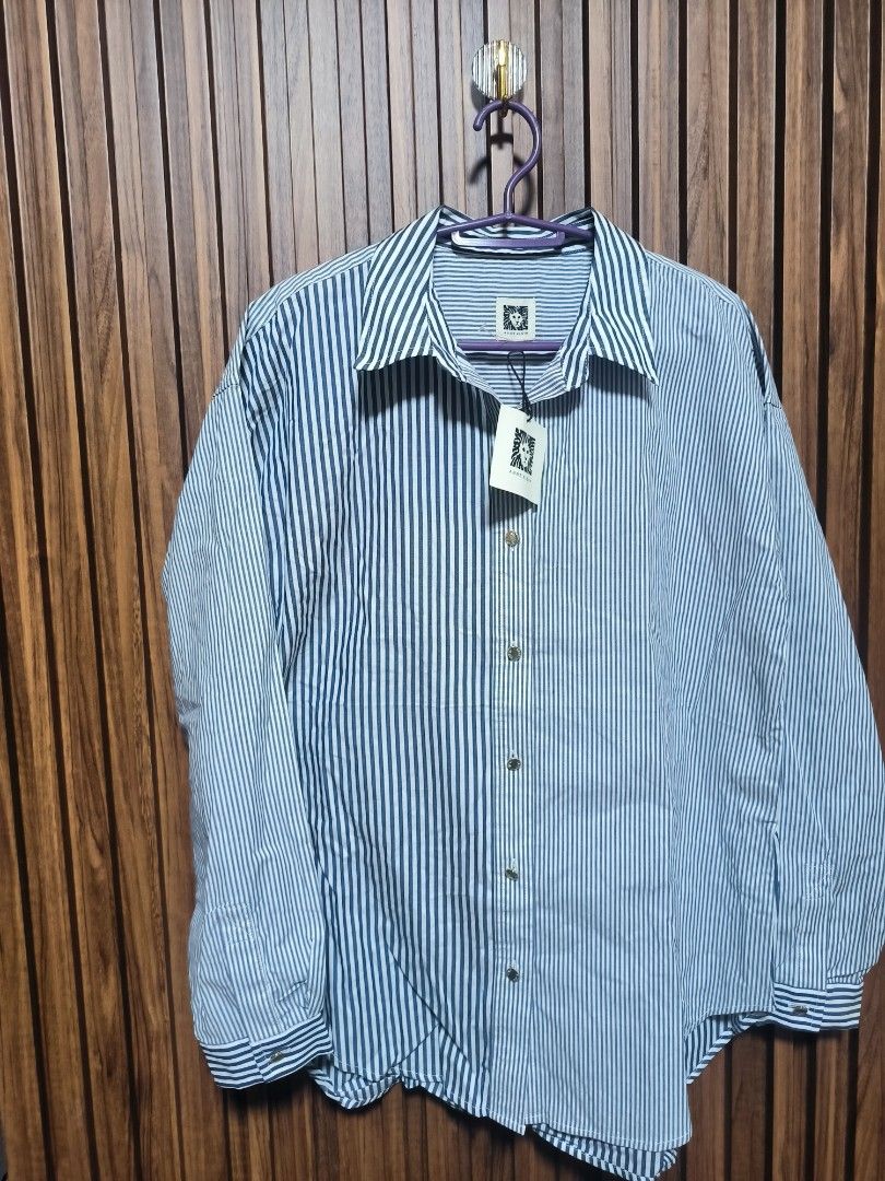 Anne klein mixed stripe button- down shirt (Category: Longsleeves) located in Cavite. Submitted by oncetop_declutter (Listing ID 1450192187, Image 1). Description: never used. stocked for 2 yrs. current trend. with hangtag need wash before use wringkled sue to storage.