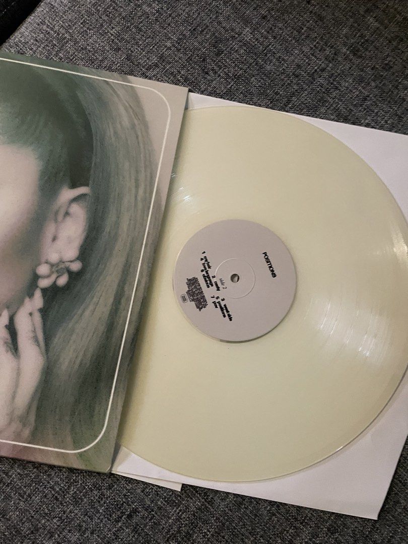 Ariana Grande Positions Vinyl Record (Category: Vinyls) located in Caloocan City. Submitted by chraefm (Listing ID 1450185589, Image 3). Description: - Ariana Grande Positions vinyl record - Features all tracks from the album - Unique pale yellow vinyl color - Album art on the front sleeve - Selling because I already own a copy.