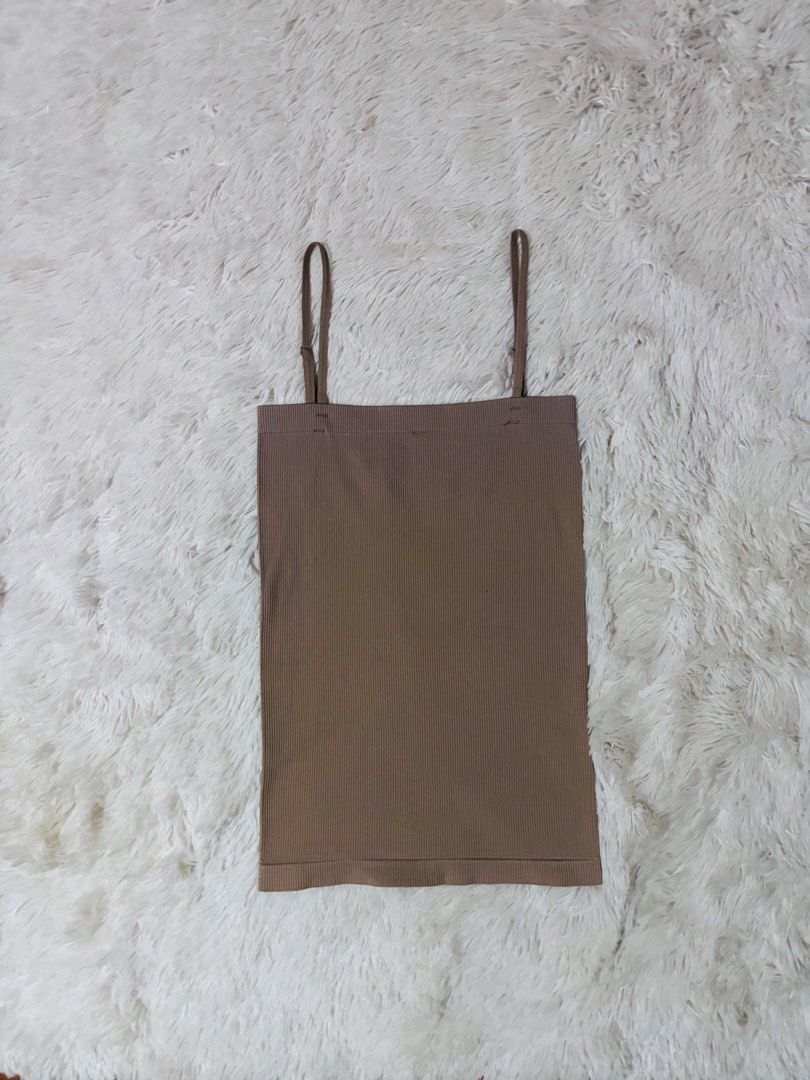 Authentic Bench Beige Skin Tone Inner Wear with Removable Strap (Category: Sleeveless) located in Bulacan. Submitted by rin2024 (Listing ID 1450261845, Image 2). Description: Authentic Bench Beige Skin Tone Inner Wear with Removable Strap - With stretchable fabric for inner wear - With removable and adjustable straps Mode of Payment: GCash only. Deliver Options: Lalamove, Grab, or J&T only, with shipping fee shouldered by buyer..