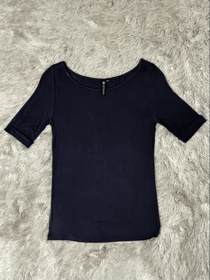 Authentic Cotton On Dark Blue Wide Neck Stretchable Top (Category: Blouses) located in Bulacan. Submitted by rin2024 (Listing ID 1450269554, Image 1). Description: Authentic Cotton On Dark Blue Wide Neck Stretchable Top - Highly stretchable, with body hugging fit - Mid-length sleeves Payment Method: GCash only. Delivery Options: Lalamove, Grab, or J&T only, with shipping fee shouldered by buyer..
