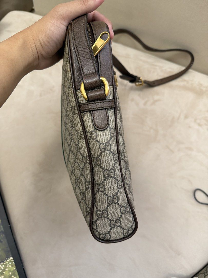 Authentic Gucci Ophidia Messenger Bag (Category: Luxury Bags & Wallets) located in Manila. Submitted by maria_2326 (Listing ID 1450175711, Image 3). Description: Gucci Ophidia Messenger Bag Guarantee Authentic Can fit ipad and 11” laptop With dust bag only Flaw: Professionally hand-painted in the top part See last two photos Location: Manila/QC.