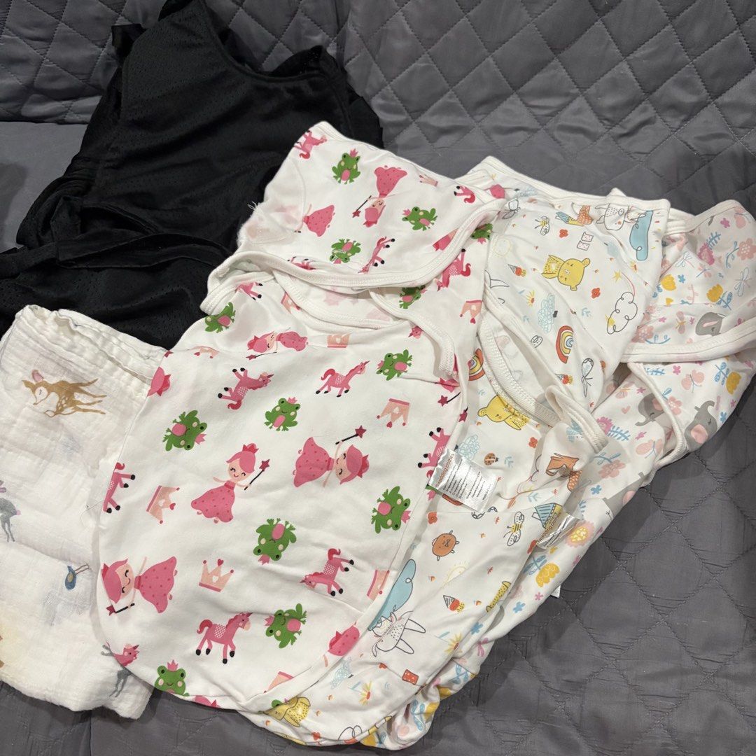 Baby Carrier & Swaddle set (Category: Babies & Kids Fashion) located in Marikina City. Submitted by marjpc (Listing ID 1450225458, Image 1). Description: - Bundle includes 3 adorable baby swaddles with cute prints (princesses, frogs, animals). - Also includes a black mesh carrier, size M. -Muslin blanket - Perfect for keeping your baby cozy and secure. - All items are clean and ready for a new home. Selling as a bundle for 390 only NO reservation