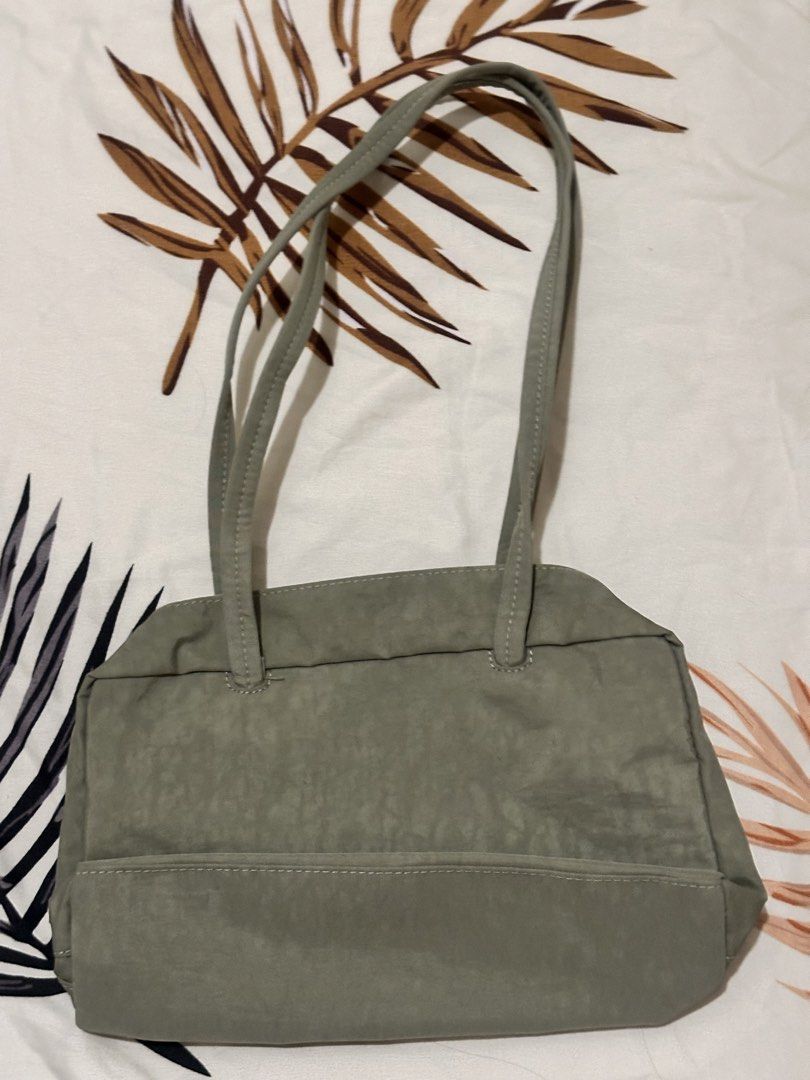 Baggu bowler bag in Celadon (Category: Shoulder Bags) located in Imus. Submitted by stufftodeclutter (Listing ID 1450137051, Image 3). Description: Bought from powerplant! Used only once! I dont plan on keeping it anymore bc i am eyeing for another style of bag 🥶 Took a pic using a flash u can slide me a dm for more pics! New pa talaga!.