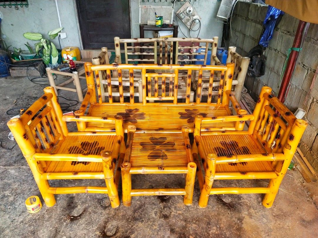 Bamboo Sofa Set with Coffee Table (Category: Sofas) located in Caloocan City. Submitted by gadayanbryanken24-38131 (Listing ID 1450219180, Image 2). Description: Selling a 4-piece bamboo living room set. Includes one sofa and two chairs. Also comes with a matching coffee table. The bamboo is varnished and has a nice sheen. Each piece has a decorative clover design burned into the seats. Great for a patio or sunroom. 📍GMA Cavite.
