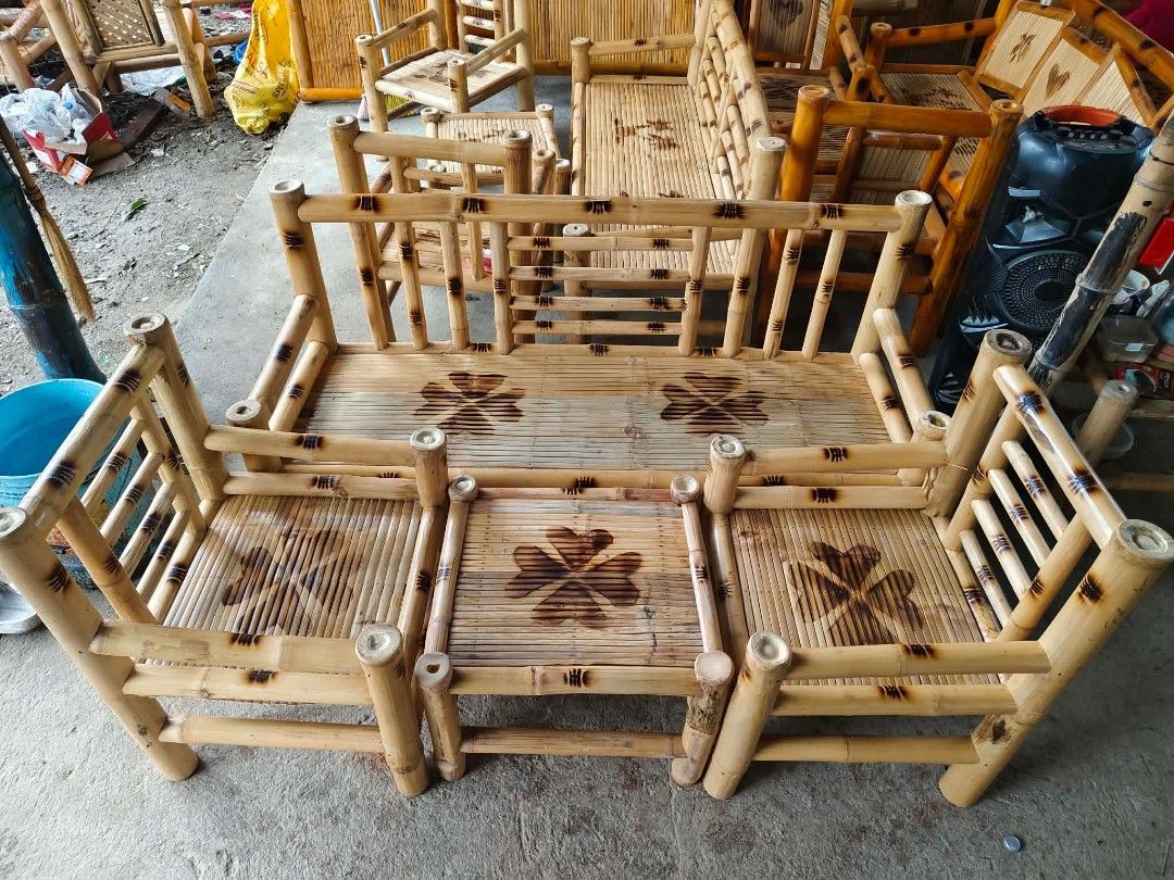 Bamboo Sofa Set with Coffee Table (Category: Sofas) located in Caloocan City. Submitted by gadayanbryanken24-38131 (Listing ID 1450219180, Image 3). Description: Selling a 4-piece bamboo living room set. Includes one sofa and two chairs. Also comes with a matching coffee table. The bamboo is varnished and has a nice sheen. Each piece has a decorative clover design burned into the seats. Great for a patio or sunroom. 📍GMA Cavite.