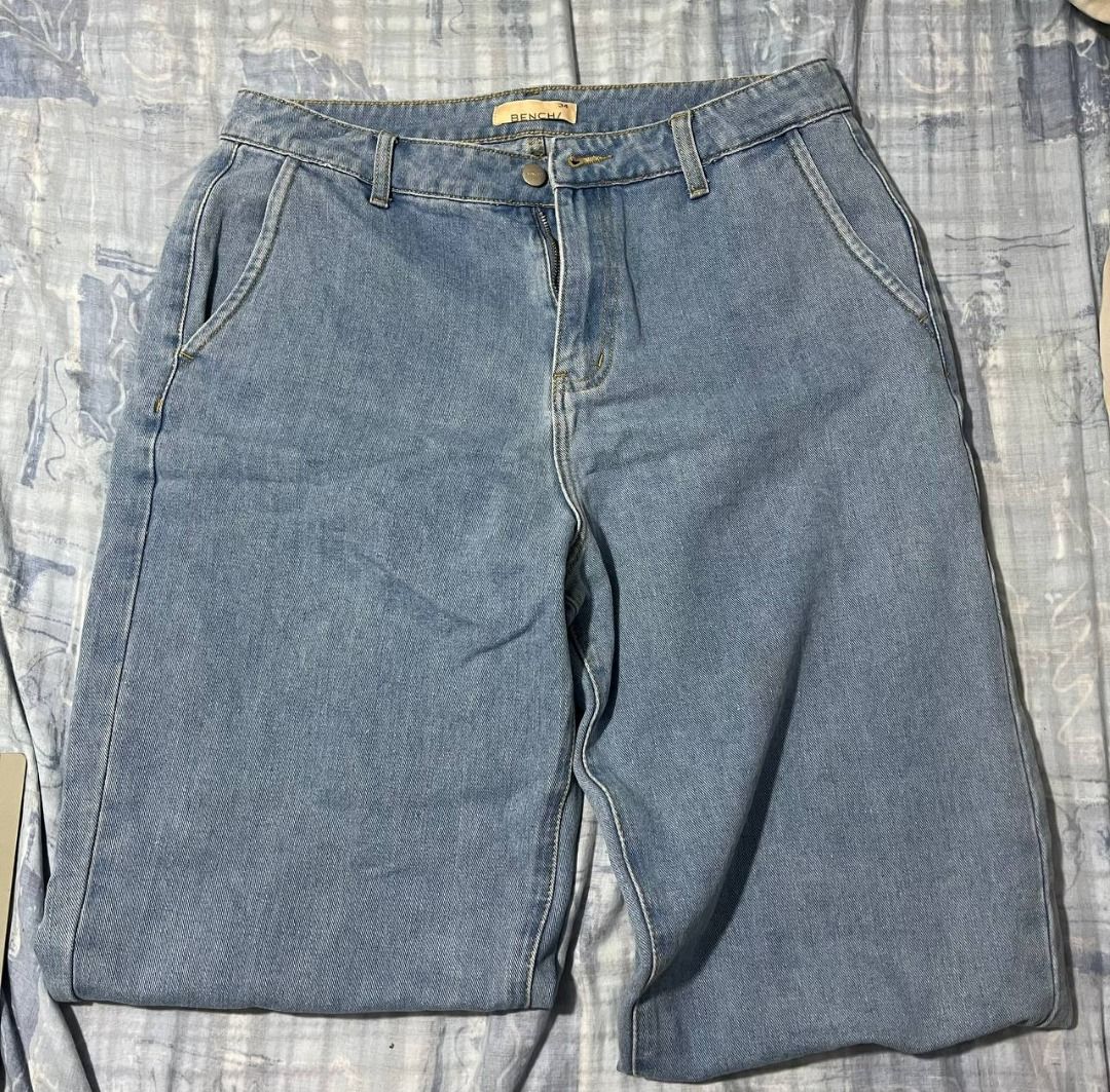 Bench Light Wash Wide Leg Jeans (Category: Jeans) located in Las Pinas. Submitted by refo1d.studio (Listing ID 1450288593, Image 1). Description: - Light wash denim jeans - Wide leg cut for a relaxed fit - Classic five-pocket styling - Button and zip fly closure - Versatile for casual outfits - Easy to pair with various tops.