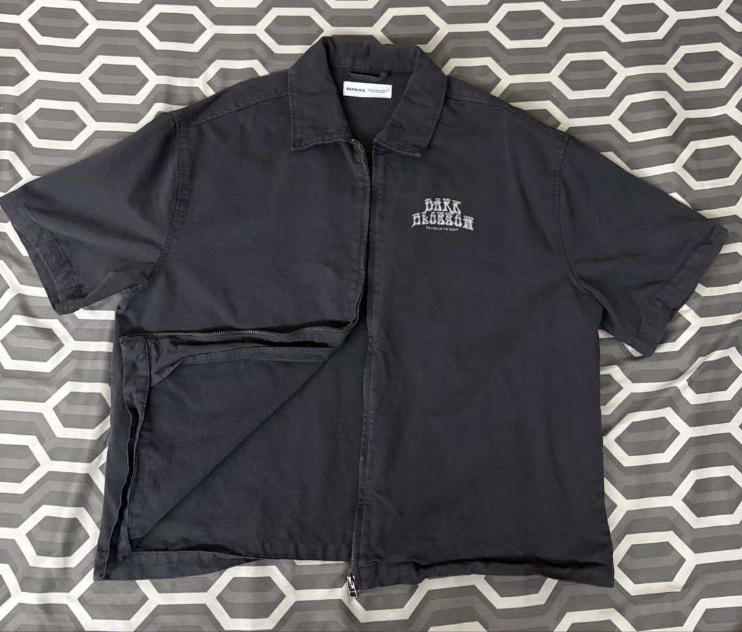 Bershka Dark Blossom Zip Up Jacket (Category: Tshirts & Polo Shirts ) located in Manila. Submitted by markrobles54253 (Listing ID 1450212969, Image 3). Description: - used once - m on tag but fits large - Bershka grey zip-up jacket - Features 'Dark Blossom The Eyes of the Night' chest graphic - Short sleeves - Collared design - Perfect for layering or as a light jacket - Please check photos for condition details.