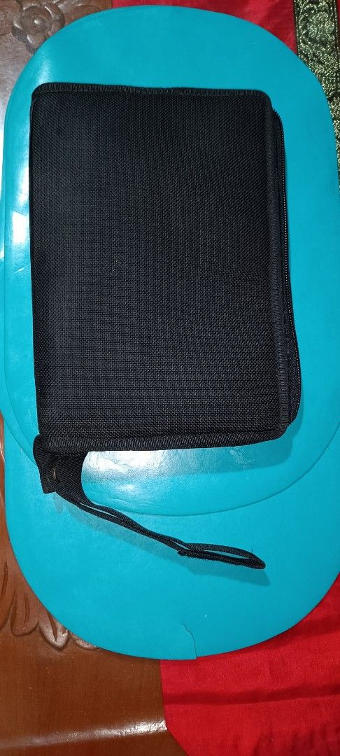 Black clutchbag gun safety case (Category: Combat Sports) located in Muntinlupa City. Submitted by k2508 (Listing ID 1450136291, Image 3). Description: - Black clutchbag gun safety case, made of strong canvass - Multiple compartments inside - Slots for cards and small items - Zipper closure - Includes a wrist strap - Ideal for keeping essentials tidy - size: (length x width x thickness) 24cm x 17cm x 4cm, can fit and ideal for cal. 9mm, cal.45mm(