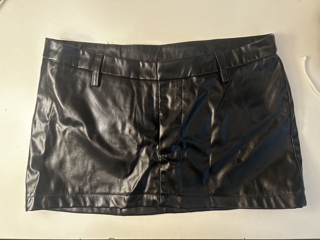 Black Faux Leather Mini Skirt (Category: Skirts) located in Manila. Submitted by franny888 (Listing ID 1450201026, Image 1). Description: .