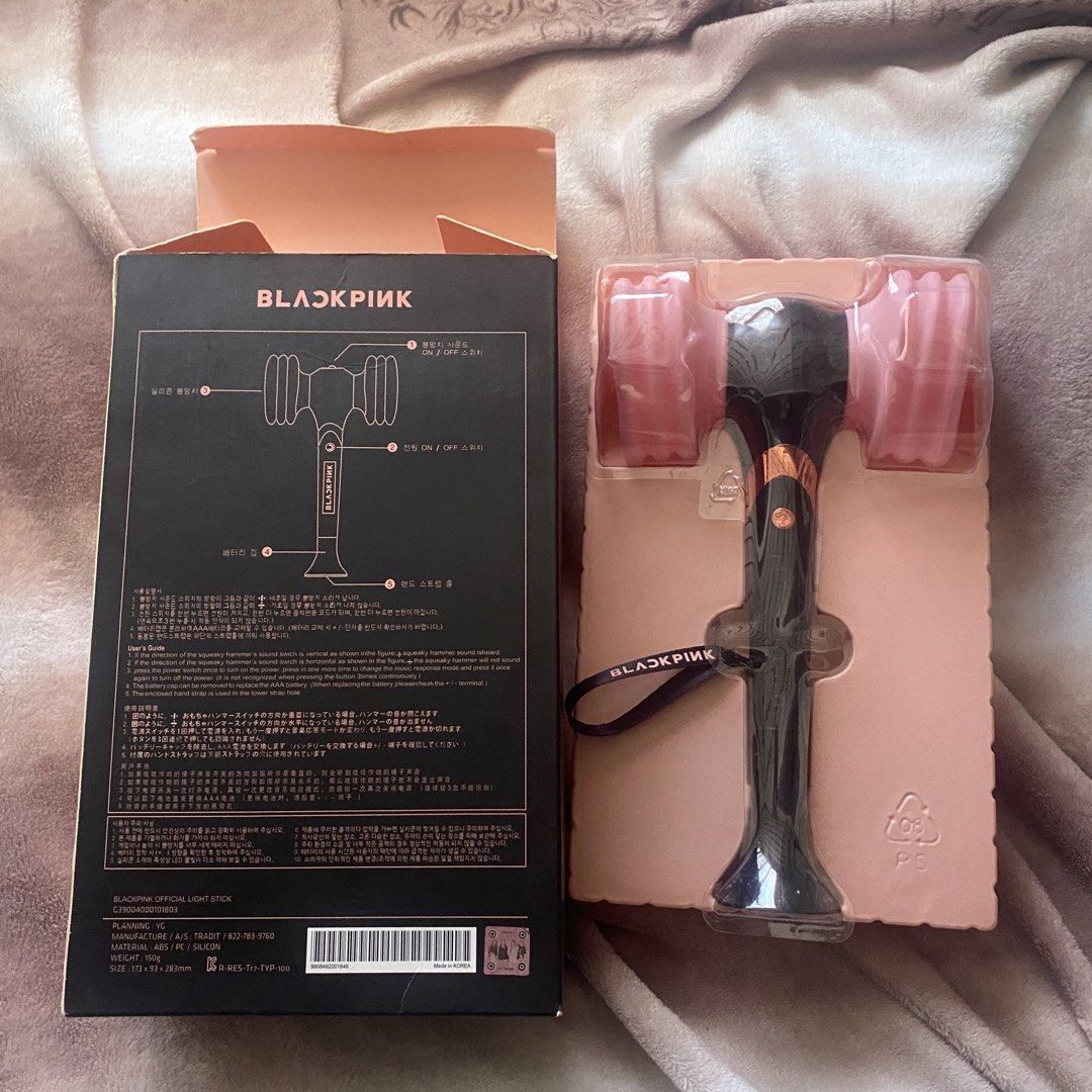 BLACKPINK Light Stick Hammer Bong Version 1 (Category: Music Accessories) located in Paranaque City. Submitted by thrifth4ul (Listing ID 1450190175, Image 3). Description: BUY AT YOUR OWN RISK AUTHENCITY NOT GUARANTEED Details: - Bought it for ₱1,700 during moa concert (2019). - Still working (just needs AAA batteries). - Still has sqeaky sound. - Displayed here, only used once. - Only hammer bong Condition: - Lightstick: 7/10 (looks clean, light