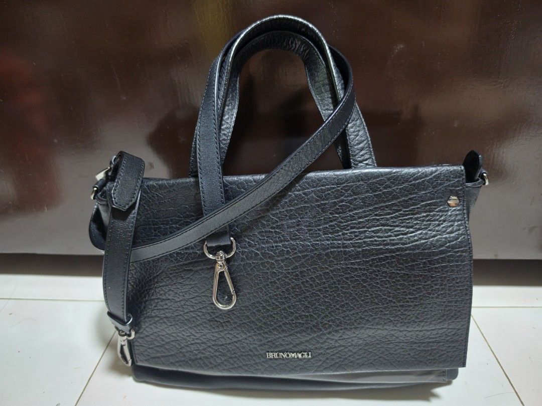 BRUNO MAGLI Black Leather Tote Bag with Shoulder Strap (Category: Tote Bags) located in San Mateo. Submitted by bambags (Listing ID 1450166020, Image 2). Description: - Brand: BRUNO MAGLI - Color: Black - Material: Textured Leather - Features: Top handles, detachable shoulder strap, silver hardware - Interior: Spacious - Best for: Everyday use, work.