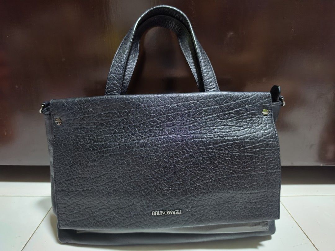 BRUNO MAGLI Black Leather Tote Bag with Shoulder Strap (Category: Tote Bags) located in San Mateo. Submitted by bambags (Listing ID 1450166020, Image 1). Description: - Brand: BRUNO MAGLI - Color: Black - Material: Textured Leather - Features: Top handles, detachable shoulder strap, silver hardware - Interior: Spacious - Best for: Everyday use, work.