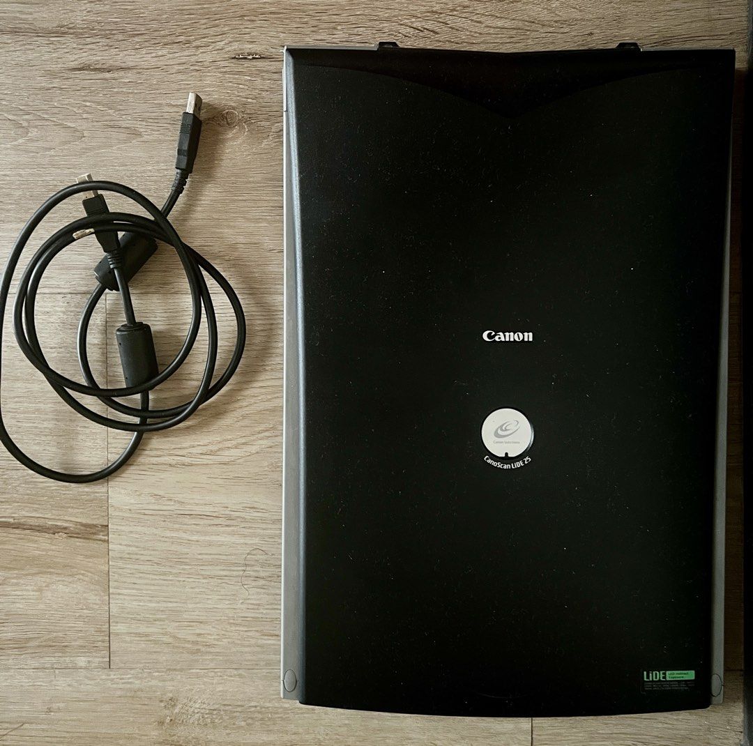 Canon CanoScan 75 Flatbed Scanner with USB Cable (Category: Printers, Scanners & Copiers) located in Quezon City. Submitted by jadeandjacob (Listing ID 1450153171, Image 1). Description: - Canon CanoScan 75 flatbed scanner - Includes USB cable - Perfect for scanning documents and photos - Simple to connect and operate - Ideal for home or office environments - Selling because it's no longer needed.