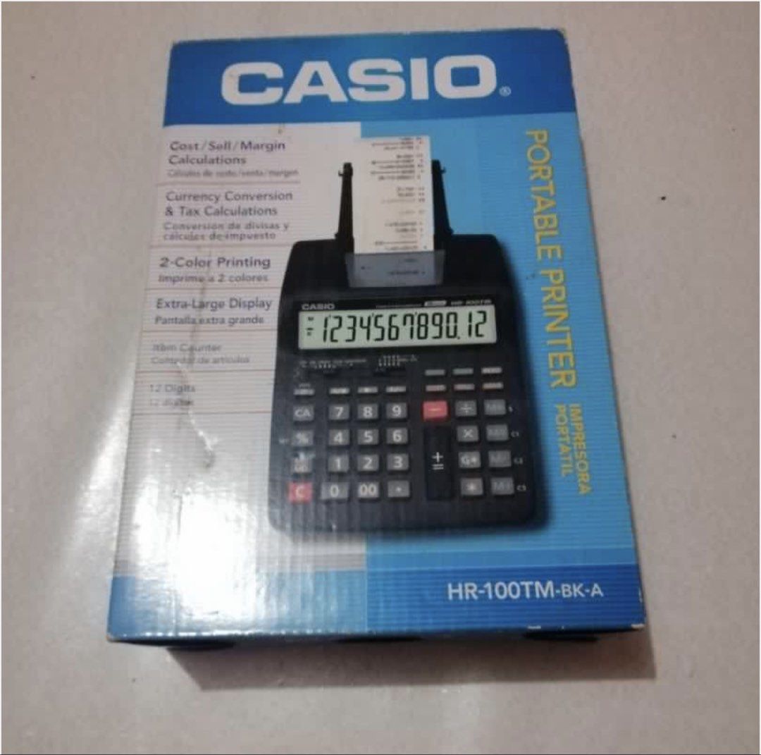 Casio HR-100TM Portable Printer Calculator (Category: Office & Business Technology) located in Quezon City. Submitted by itmakescynch (Listing ID 1450287213, Image 2). Description: - Casio HR-100TM Portable Printer Calculator - Key Features: Cost/Sell/Margin, Currency Conversion, Tax Calculations - 2-Color Printing - Extra-Large Display - Includes User Guide - Ideal for Business and Personal Use.