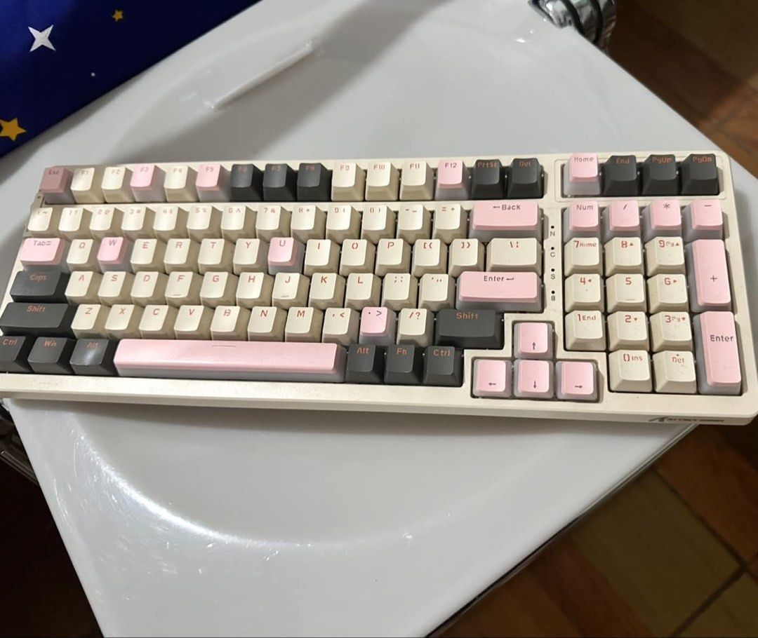 Cream and pink mechanical Keyboard (Category: Computer Keyboard) located in Manila. Submitted by rizmnl (Listing ID 1450168792, Image 1). Description: Wired Hot swappable Can give you free keycaps (orange and pink).