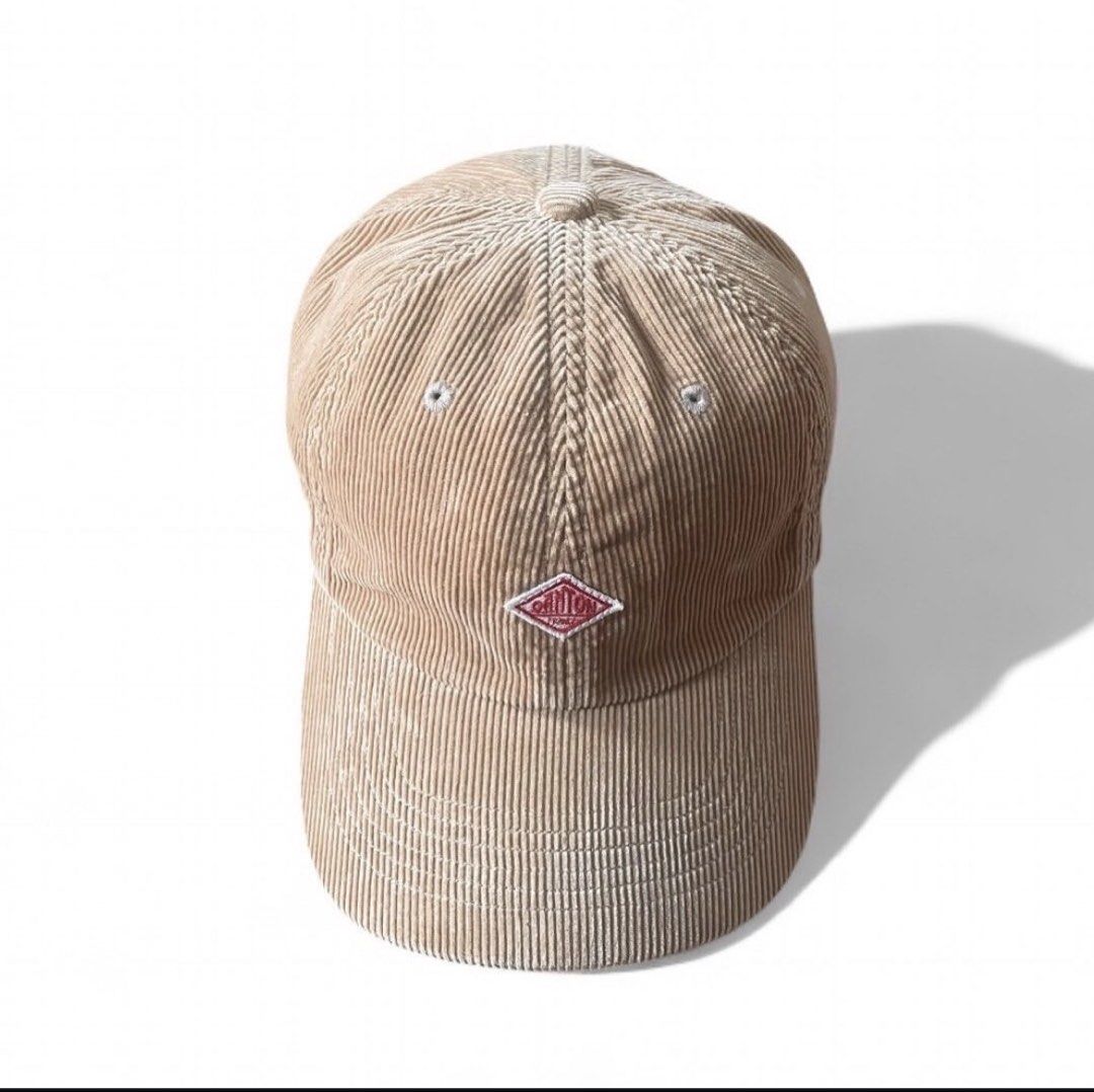 Danton Corduroy 6 panel cap (Category: Activewear) located in Binan City. Submitted by ronsanchez (Listing ID 1450297278, Image 1). Description: Danton 6 Panel Cap corduroy Beige Very minimal sign of wear. Excellent Condition. The Danton 6-Panel Cap is a stylish accessory crafted from 100% cotton, featuring a classic six-panel design with an adjustable strap for a comfortable fit. The cap is adorned with the iconic Danton logo, adding a touch of 