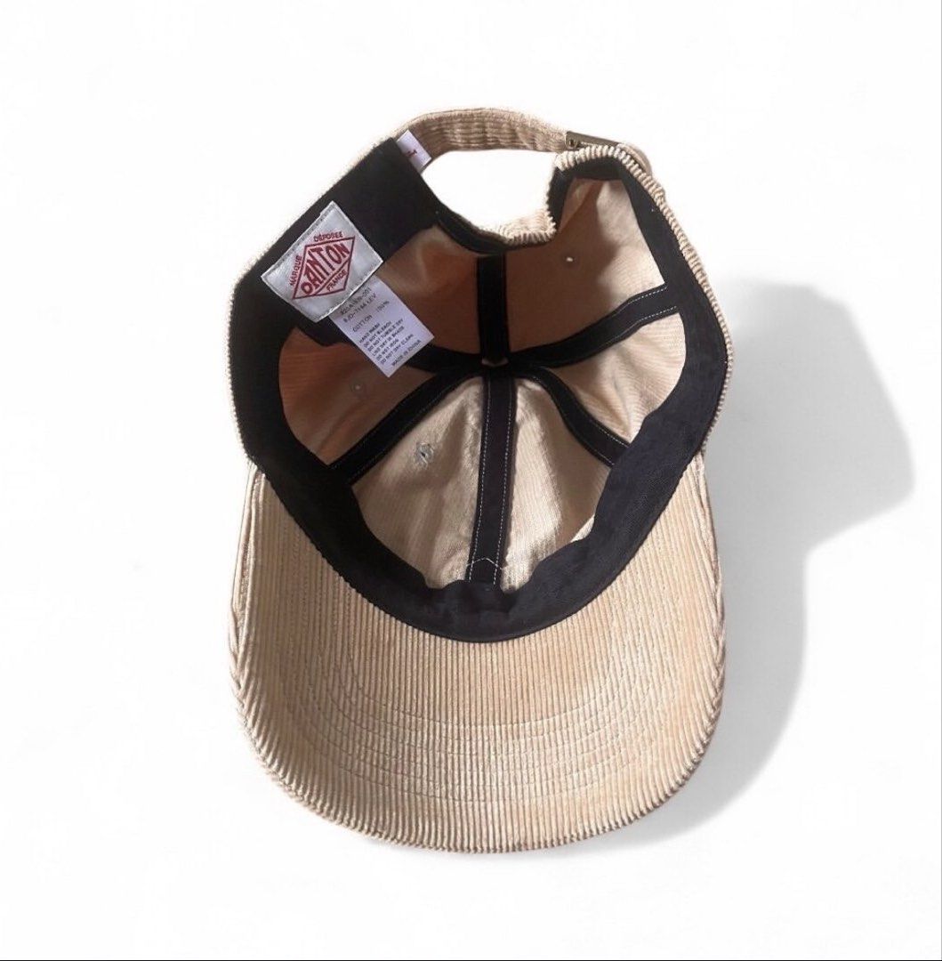 Danton Corduroy 6 panel cap (Category: Activewear) located in Binan City. Submitted by ronsanchez (Listing ID 1450297278, Image 2). Description: Danton 6 Panel Cap corduroy Beige Very minimal sign of wear. Excellent Condition. The Danton 6-Panel Cap is a stylish accessory crafted from 100% cotton, featuring a classic six-panel design with an adjustable strap for a comfortable fit. The cap is adorned with the iconic Danton logo, adding a touch of 